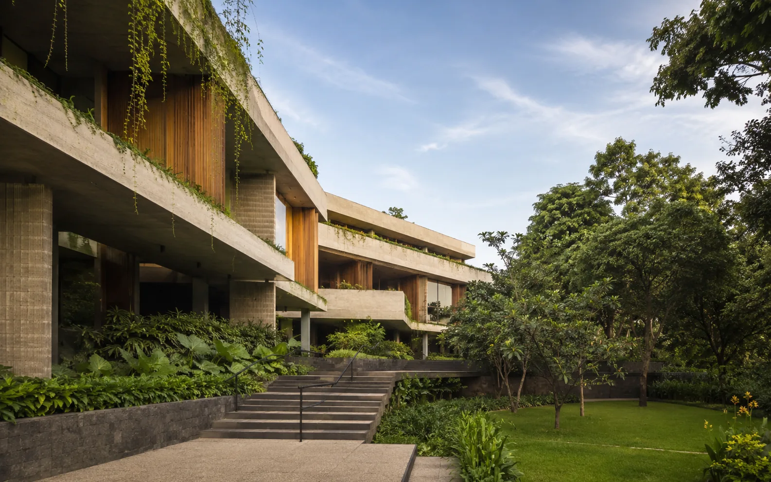 Contemporary tropical residence with timber screens and a reflecting pool